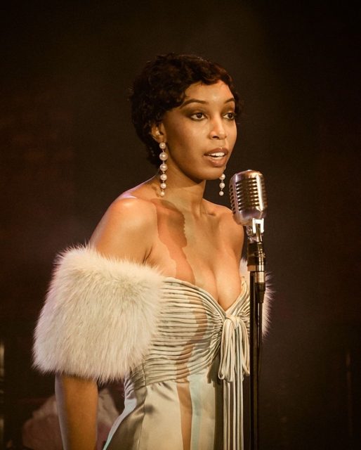 Aerie Williams as Josephine Baker at a vintage microphone